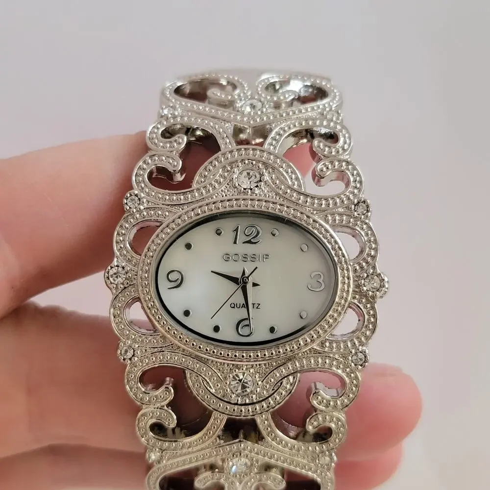 Gossip GSP5D3 Womens Watch Silver Case White Oval Dial Bangle Bracelet Quartz